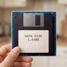 Floppy Disk ceramic coasters set of 4, in hand
