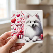 American Eskimo Dog ceramic coasters set of 4, in hand