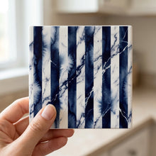 Bold Stripes ceramic coasters set of 4, in hand