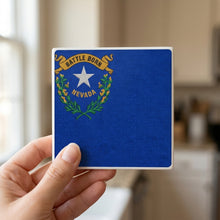 Nevada State Flag ceramic coasters set of 4, in hand