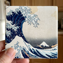 Great Wave ceramic coasters set of 4, in hand
