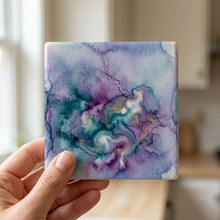 Watercolor Ombre ceramic coasters set of 4, in hand