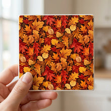 Autumn Leaves ceramic coasters set of 4, in hand