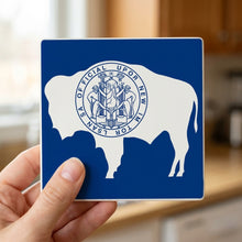 Wyoming State Flag ceramic coasters set of 4, in hand