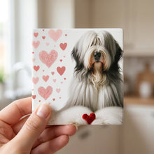 Old English Sheepdog ceramic coasters set of 4, in hand