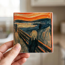 The Scream ceramic coasters set of 4, in hand