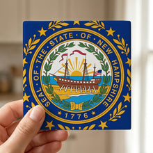 New Hampshire State Flag ceramic coasters set of 4, in hand