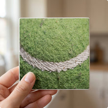 Tennis Ball ceramic coasters set of 4, in hand