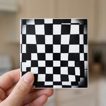 Checkerboard ceramic coasters set of 4, in hand