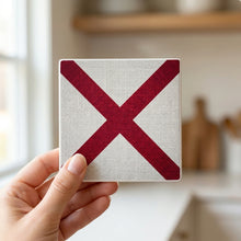 Alabama State Flag ceramic coasters set of 4, in hand