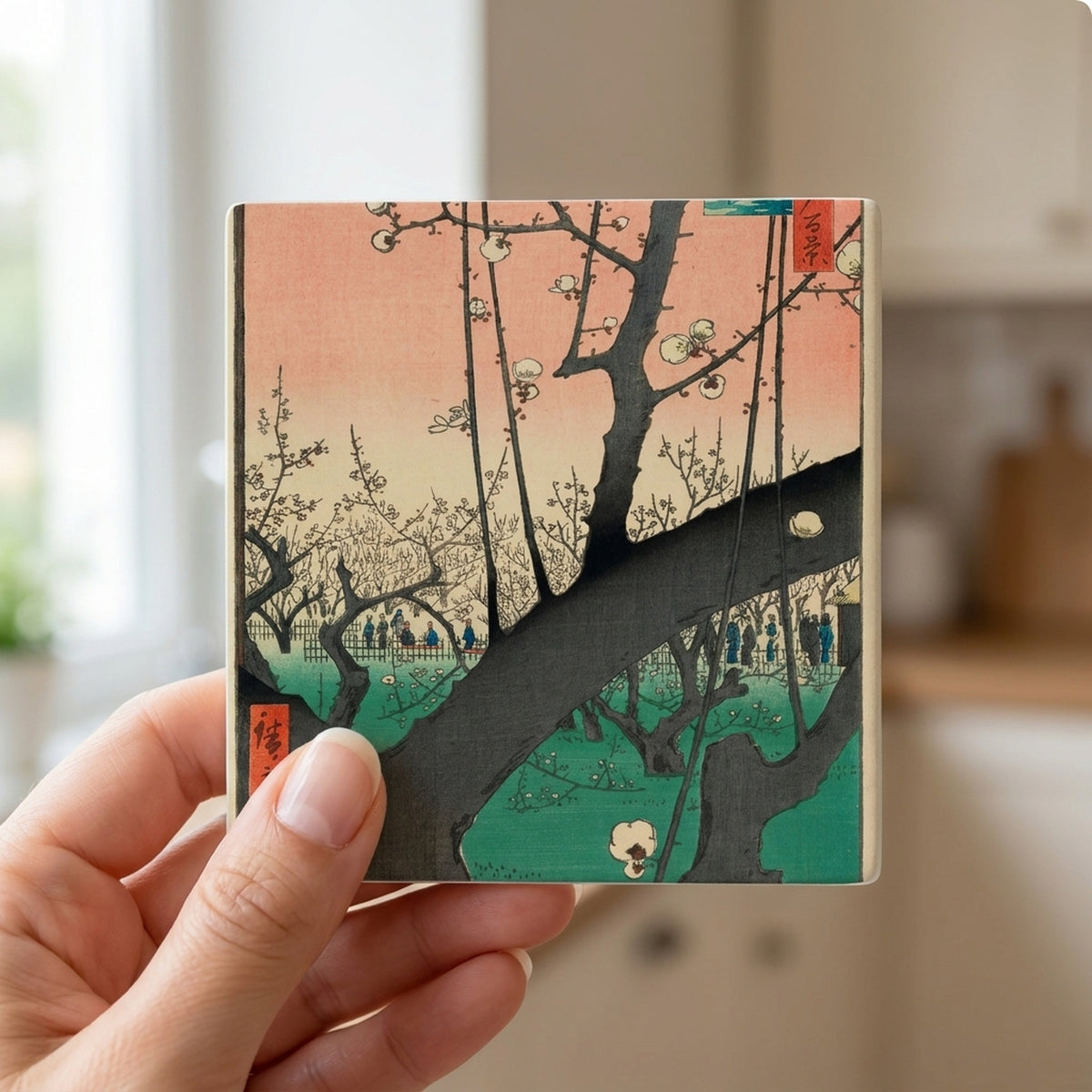 Hokusai Plum Blossom ceramic coasters set of 4, in hand