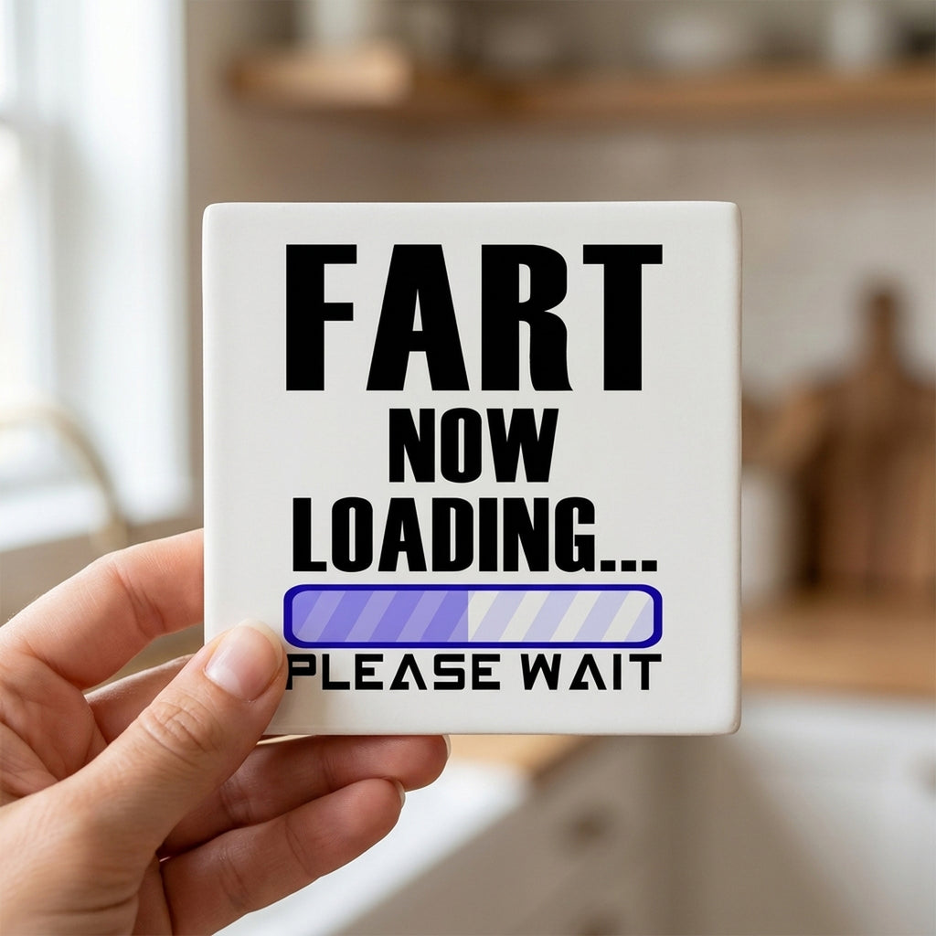 Fart Now Loading - Please Wait ceramic coasters set of 4, in hand