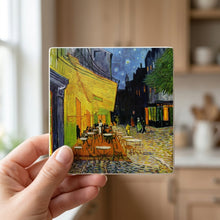 Cafe Terrace At Night ceramic coasters set of 4, in hand