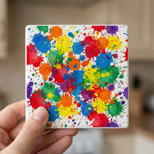 Paint Splatter ceramic coasters set of 4, in hand