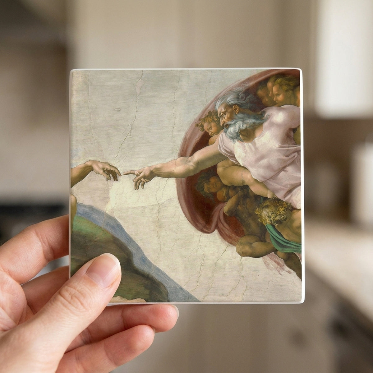 Creation Of Adam ceramic coasters set of 4, in hand