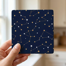 Starry Night Sky ceramic coasters set of 4, in hand