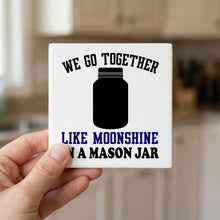 We Go Together Like Moonshine in a Mason Jar ceramic coasters set of 4, in hand