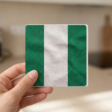 Nigeria Flag Pride ceramic coasters set of 4, in hand