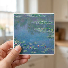 Monet Water Lilies ceramic coasters set of 4, in hand