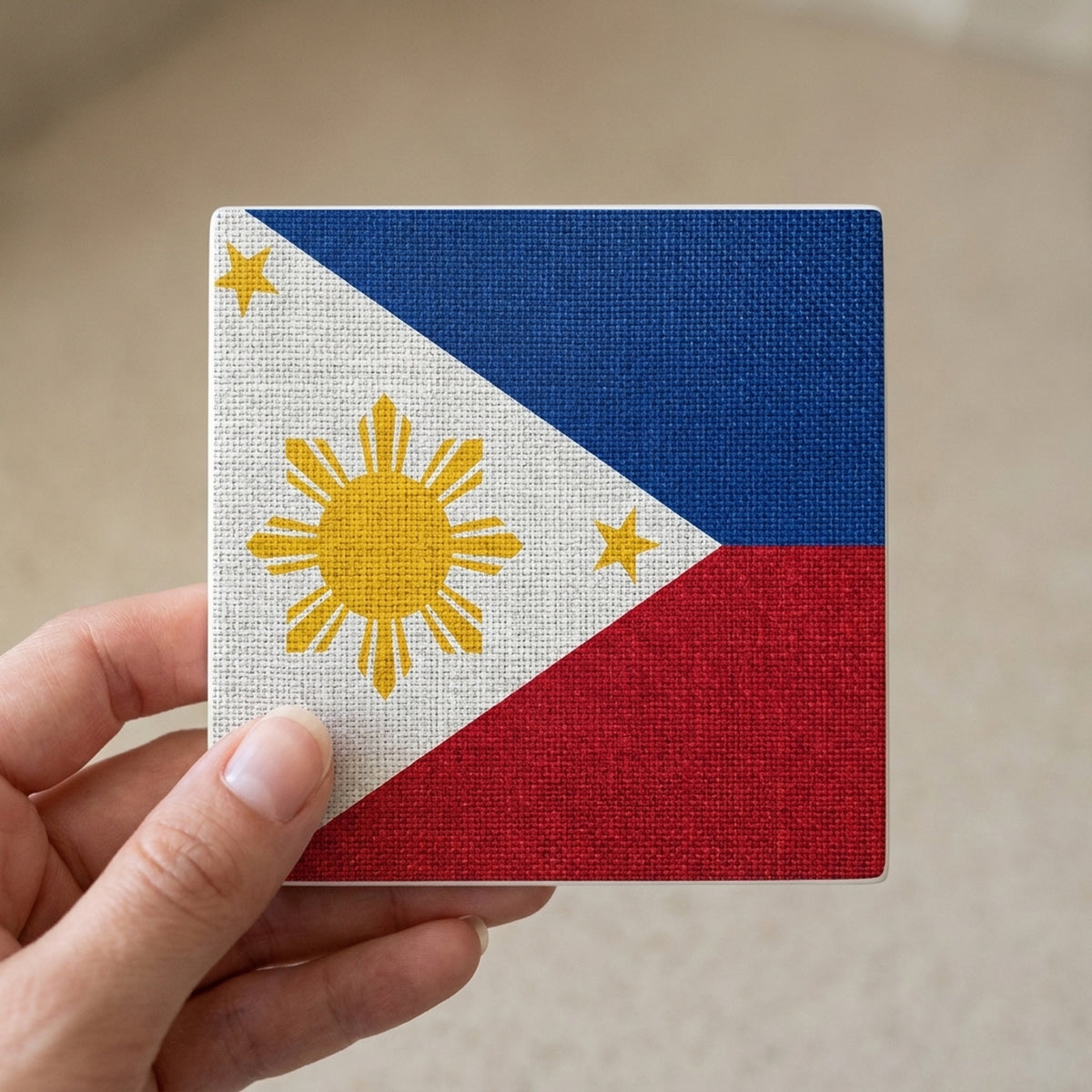 Philippines Flag Pride ceramic coasters set of 4, in hand