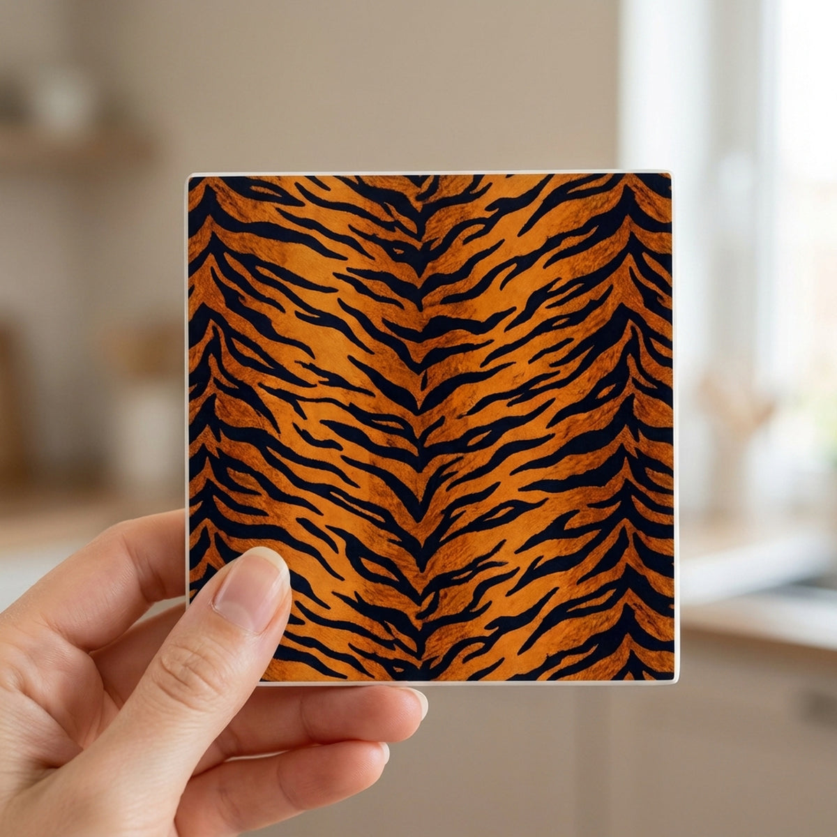 Tiger Stripe ceramic coasters set of 4, in hand