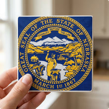 Nebraska State Flag ceramic coasters set of 4, in hand