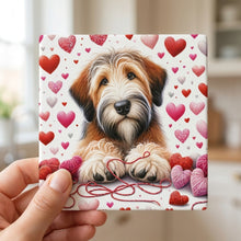 Briard ceramic coasters set of 4, in hand