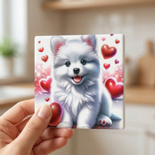 Pomeranian ceramic coasters set of 4, in hand