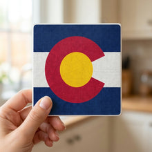 Colorado State Flag ceramic coasters set of 4, in hand