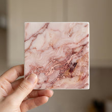 Blush Pink Marble ceramic coasters set of 4, in hand