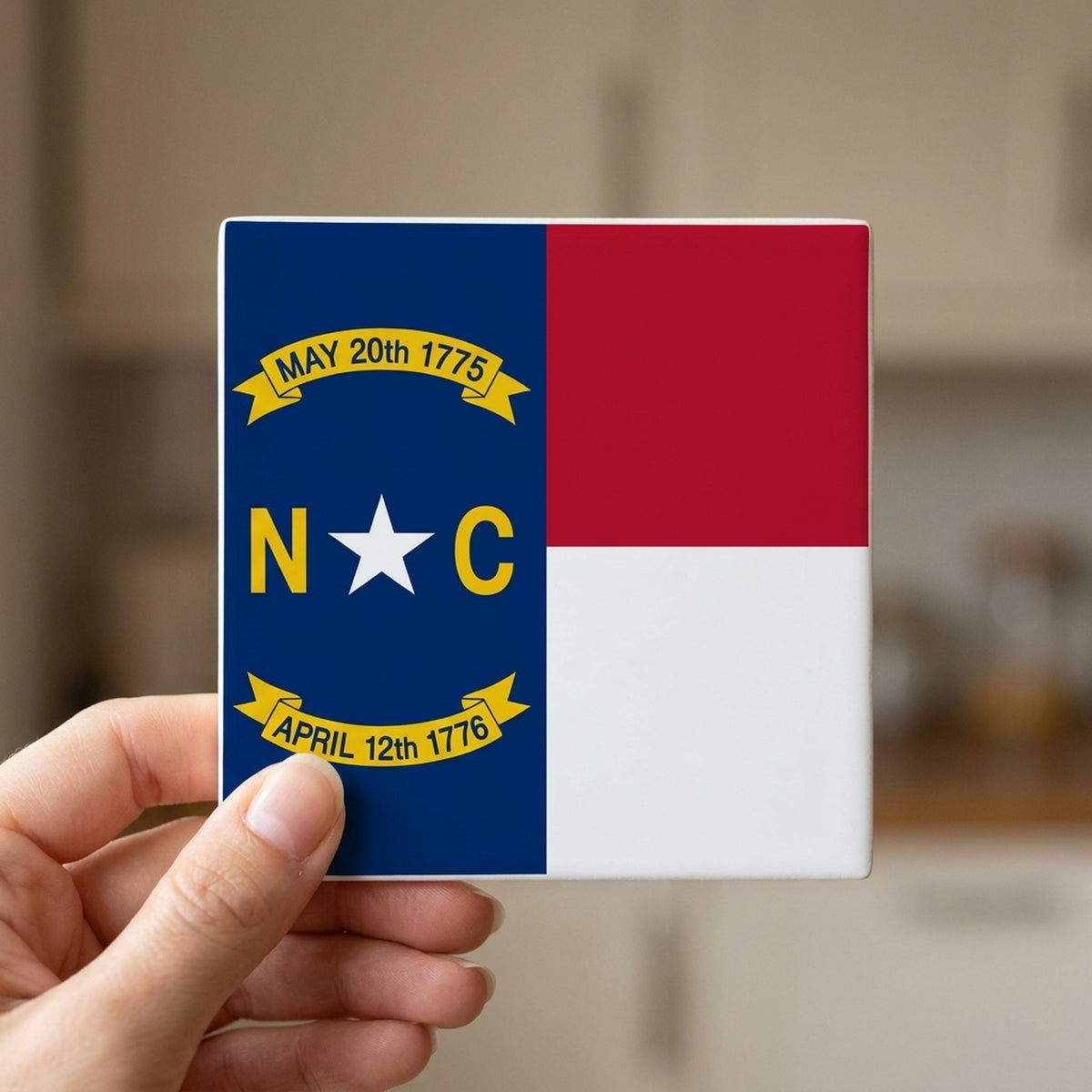 North Carolina State Flag ceramic coasters set of 4, in hand