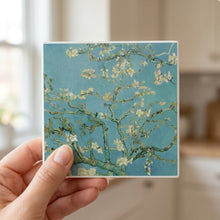 Almond Blossoms ceramic coasters set of 4, in hand