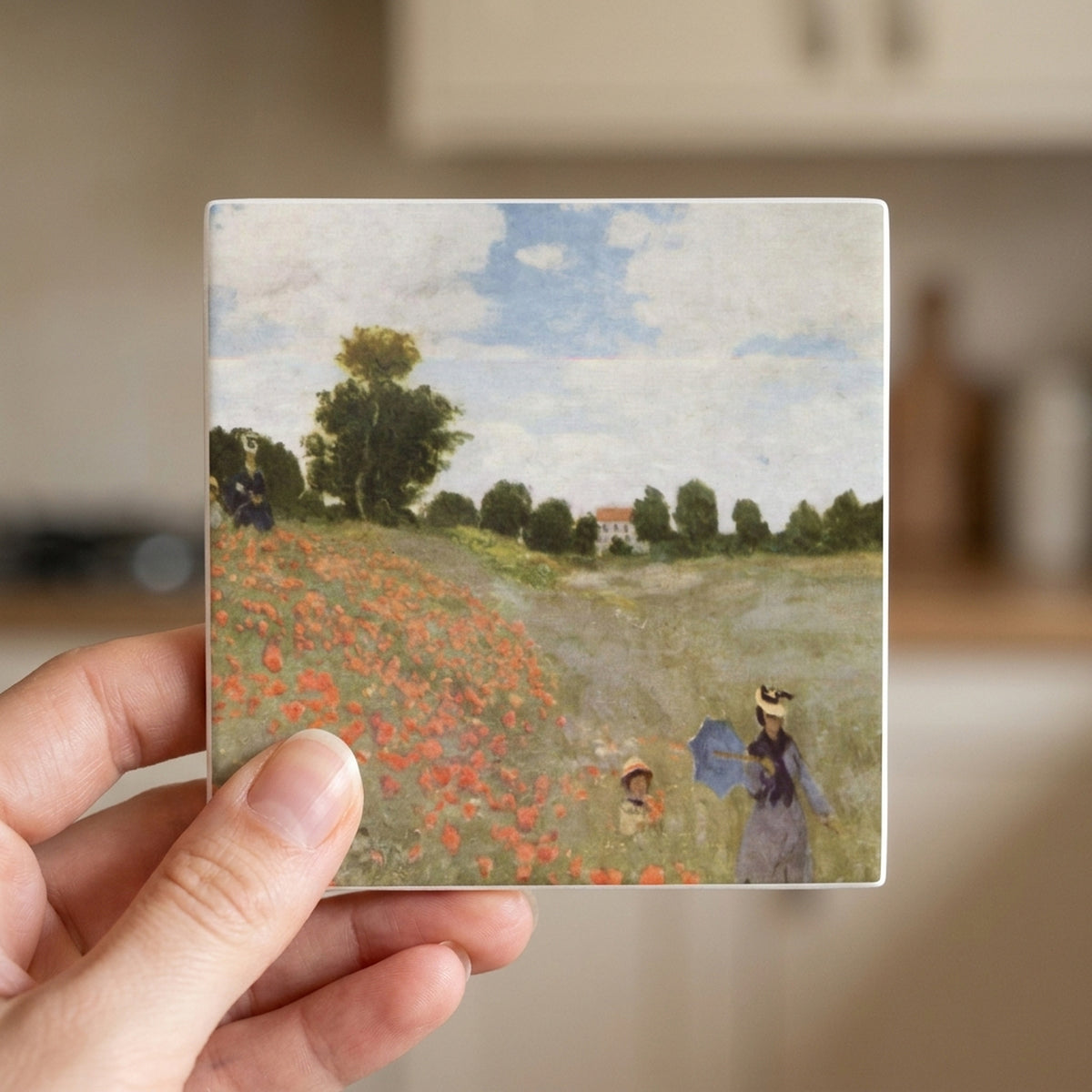 Monet Poppies ceramic coasters set of 4, in hand