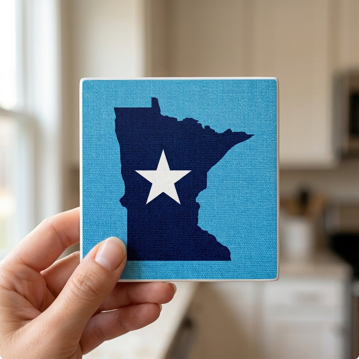 Minnesota State Flag ceramic coasters set of 4, in hand
