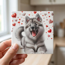 Keeshond ceramic coasters set of 4, in hand