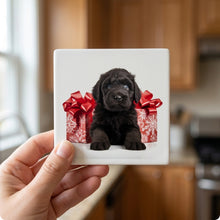 Black Russian Terrier Puppy ceramic coasters set of 4, in hand