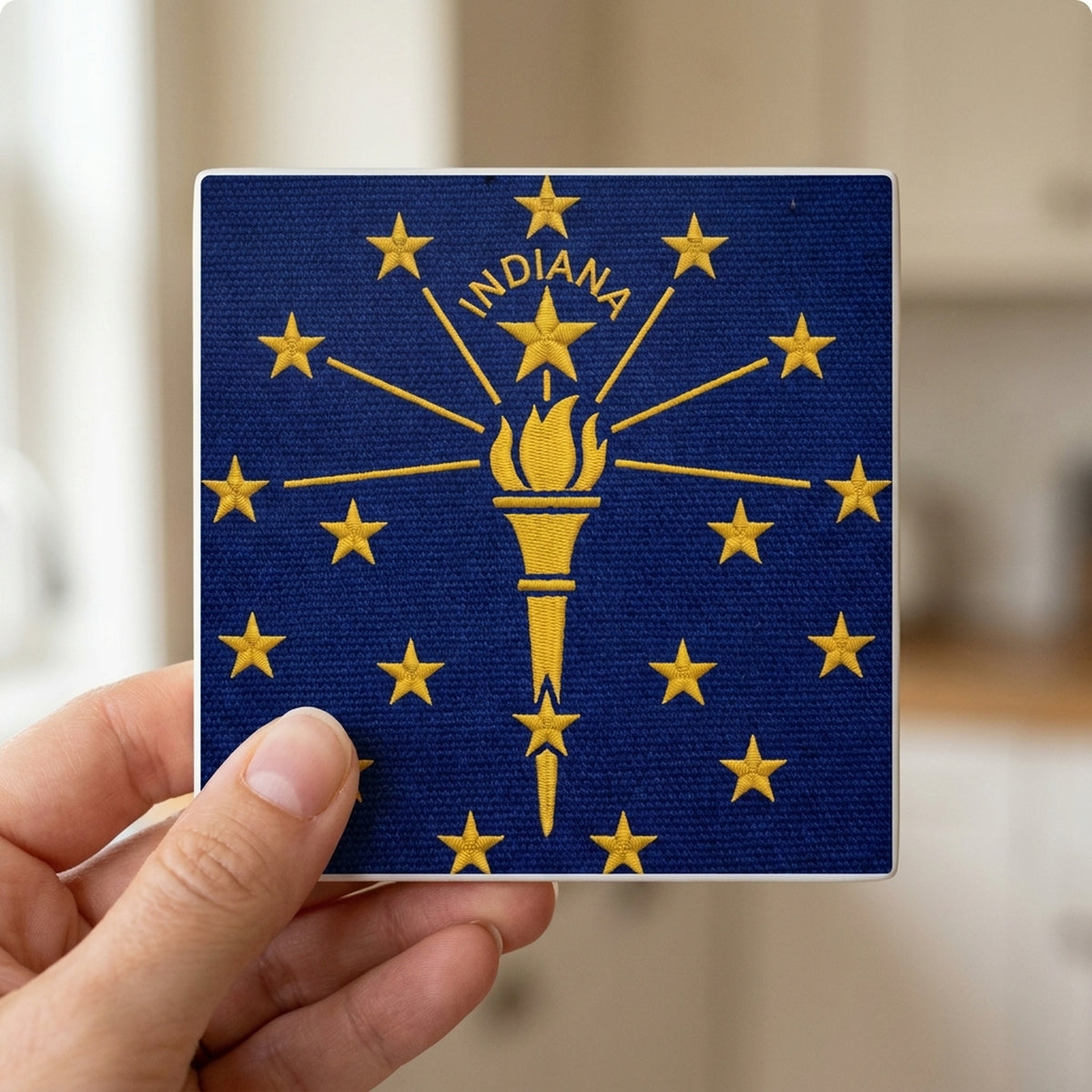 Indiana State Flag ceramic coasters set of 4, in hand