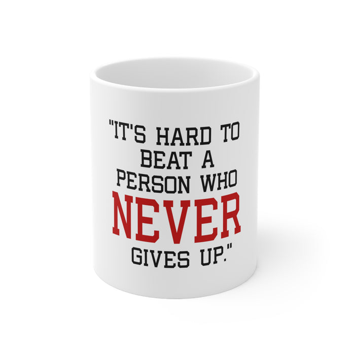 DistinctInk Glossy White Coffee / Tea Mug - It's Hard to Beat a Person Who Never Gives Up