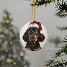 DistinctInk Hanging Ceramic Christmas Tree Ornament with Gold String - Great Gift/Present - 2 3/4 inch Diameter - Black and Tan Coonhound Puppy Design