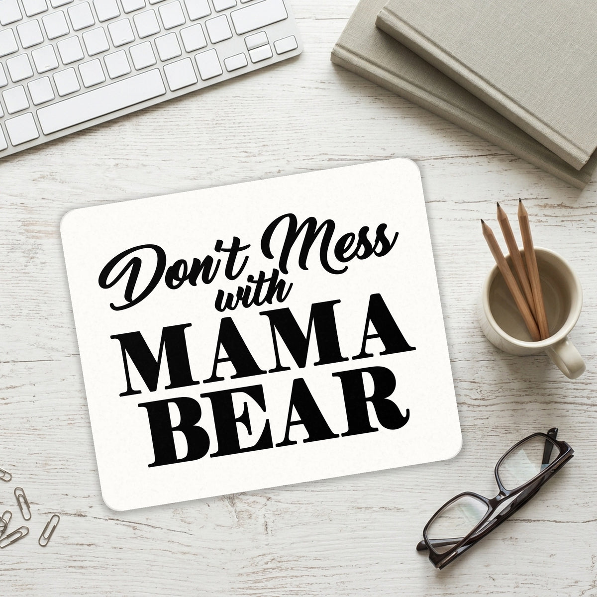 Don't Mess with MAMA BEAR mouse pad on a desk with a keyboard
