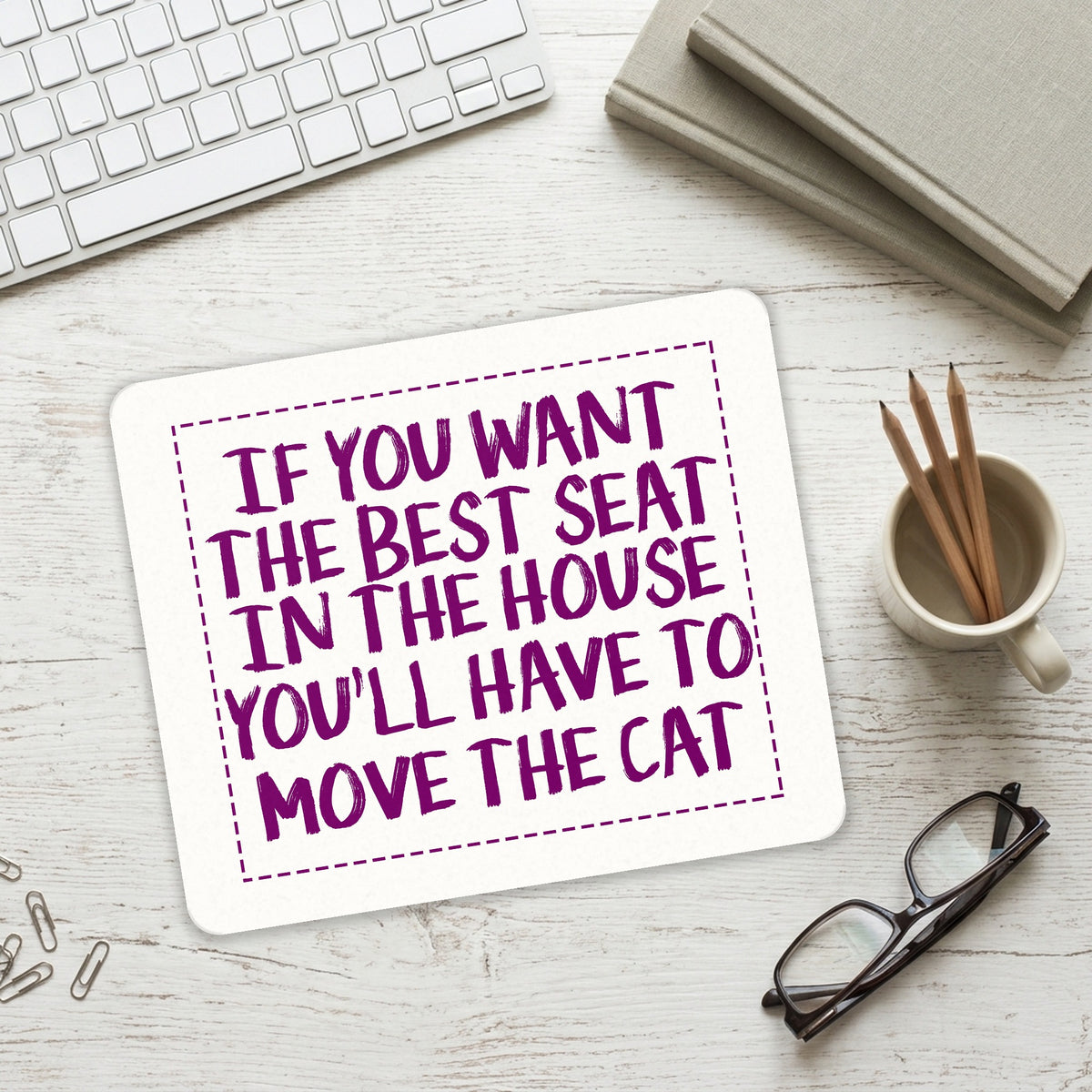 Want the Best Seat, Have to Move the Cat mouse pad on a desk with a keyboard