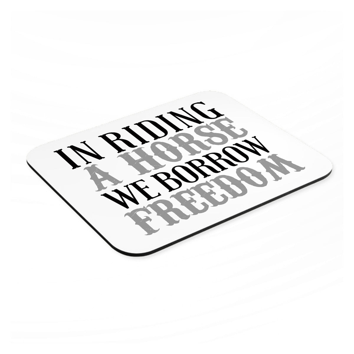 In Riding a Horse, We Borrow Freedom mouse pad, angled view showing the 1/4 inch thick base