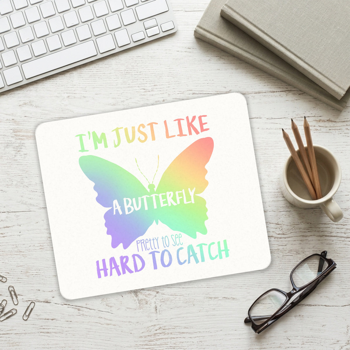 Like Butterfly - Pretty to See Hard to Catch mouse pad on a desk with a keyboard