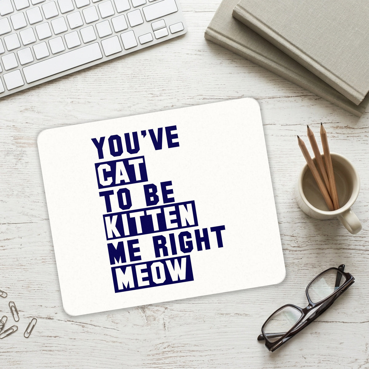 You've Cat to be Kitten Me Meow mouse pad on a desk with a keyboard