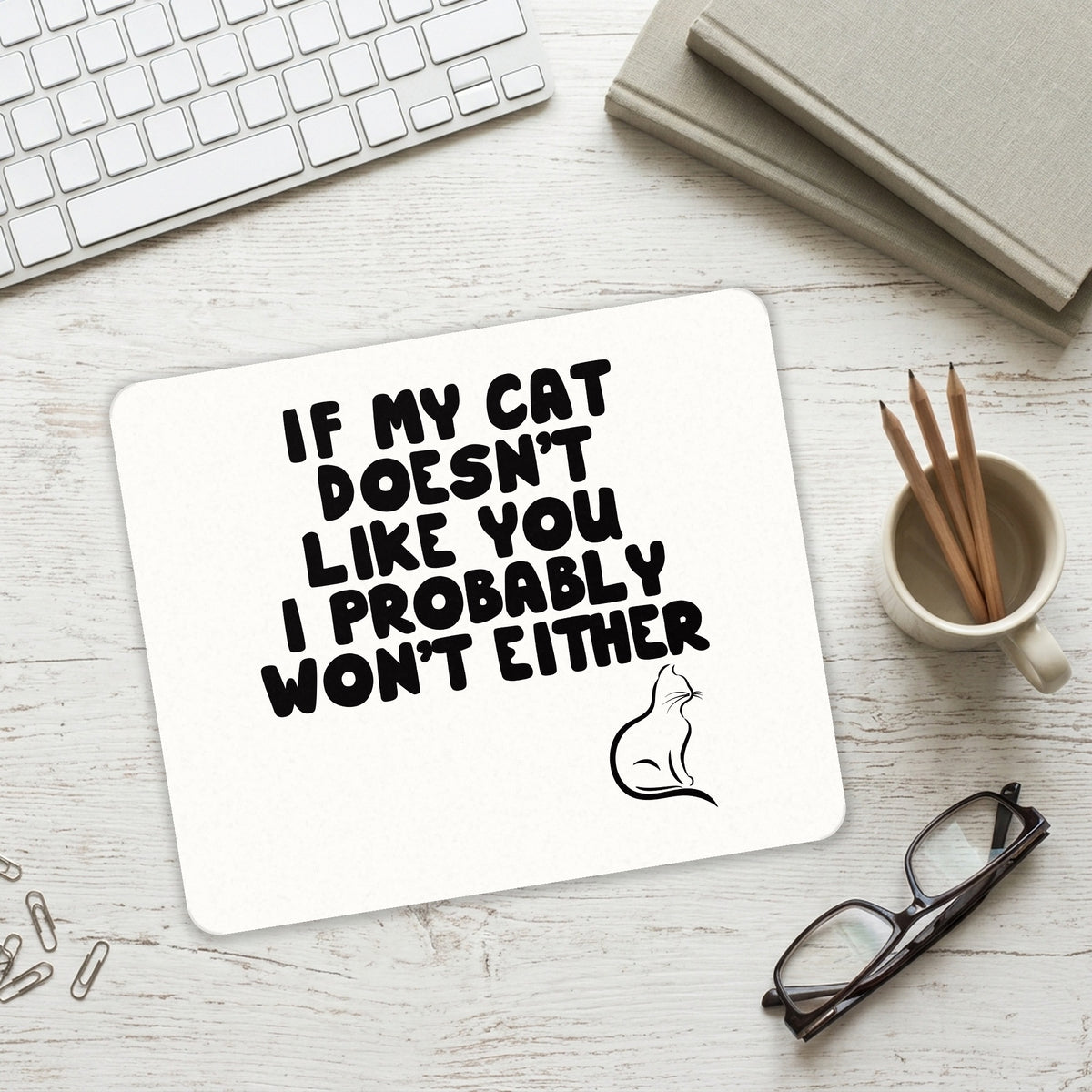 If My Cat Doesn't Like You I Won't Either mouse pad on a desk with a keyboard