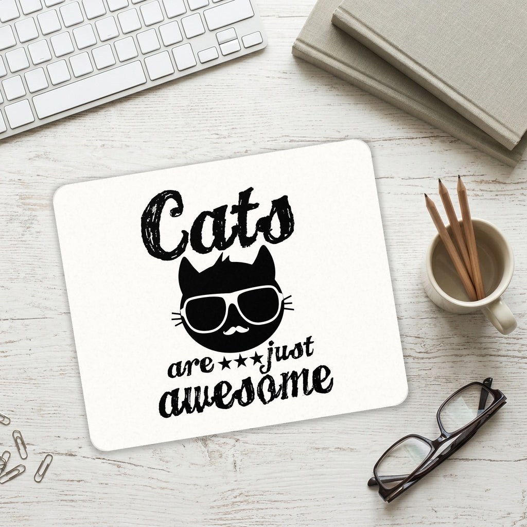 Cats Are Just Awesome mouse pad on a desk with a keyboard