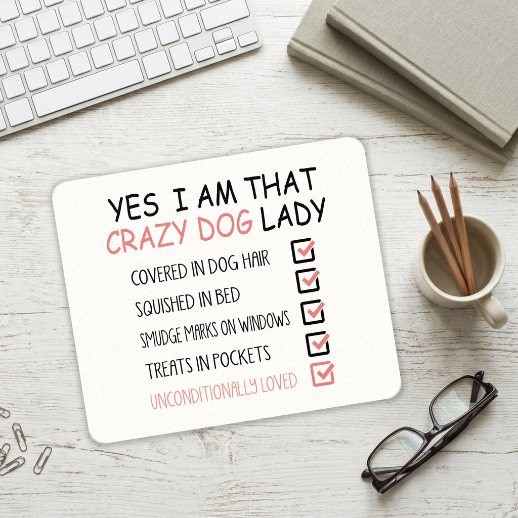 Yes, I Am That Crazy Dog Lady mouse pad on a desk with a keyboard
