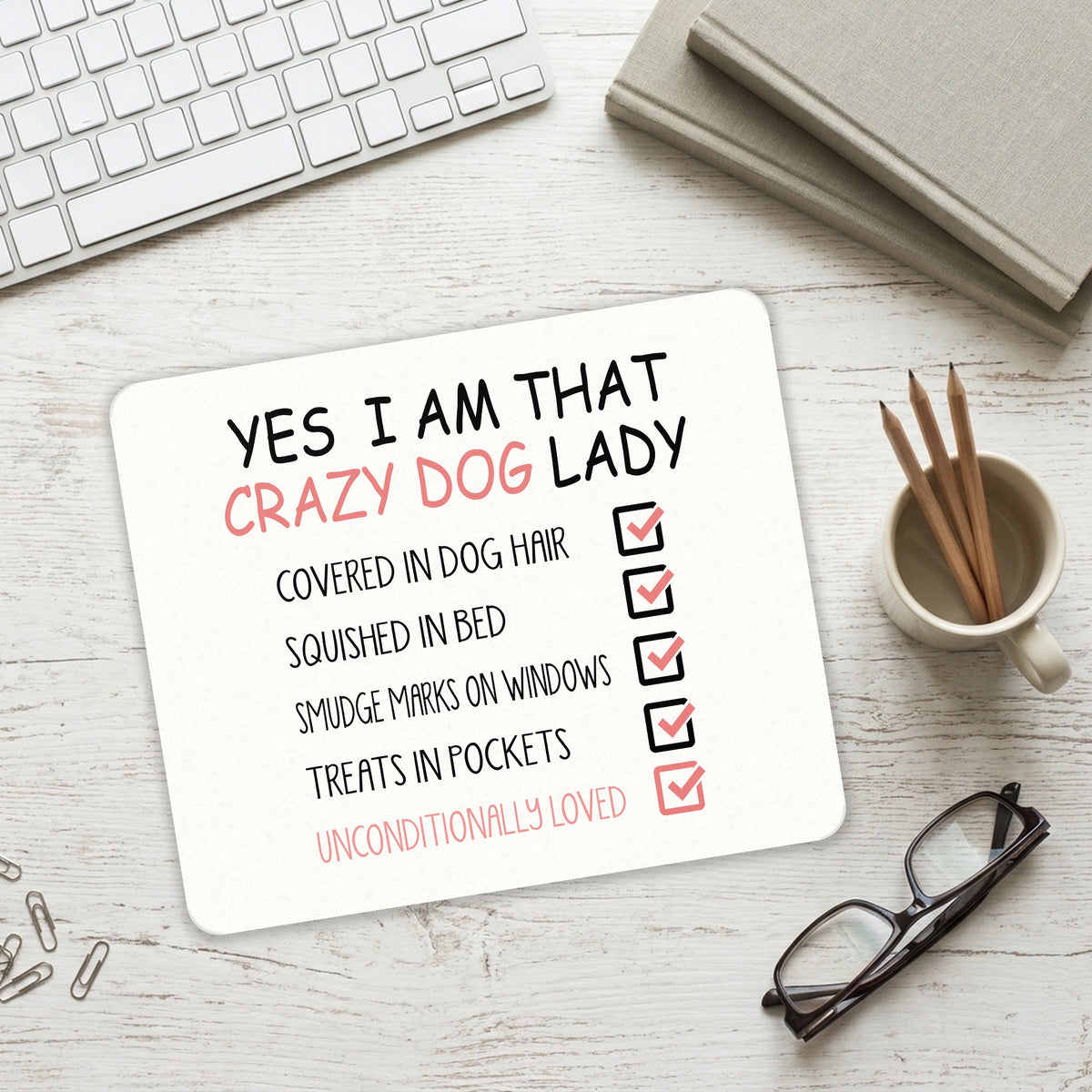 Yes, I Am That Crazy Dog Lady mouse pad on a desk with a keyboard