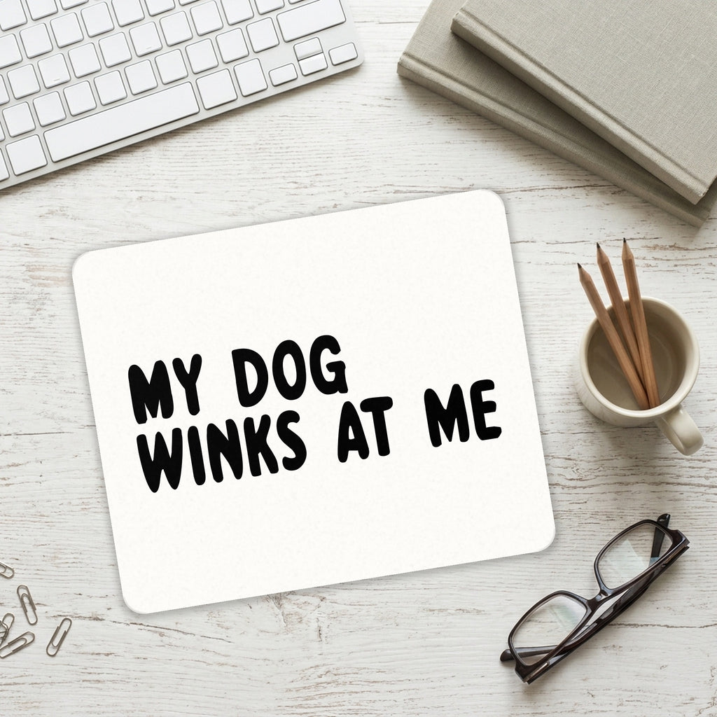 Tell Me It's Just a Dog - You're an Idiot mouse pad on a desk with a keyboard