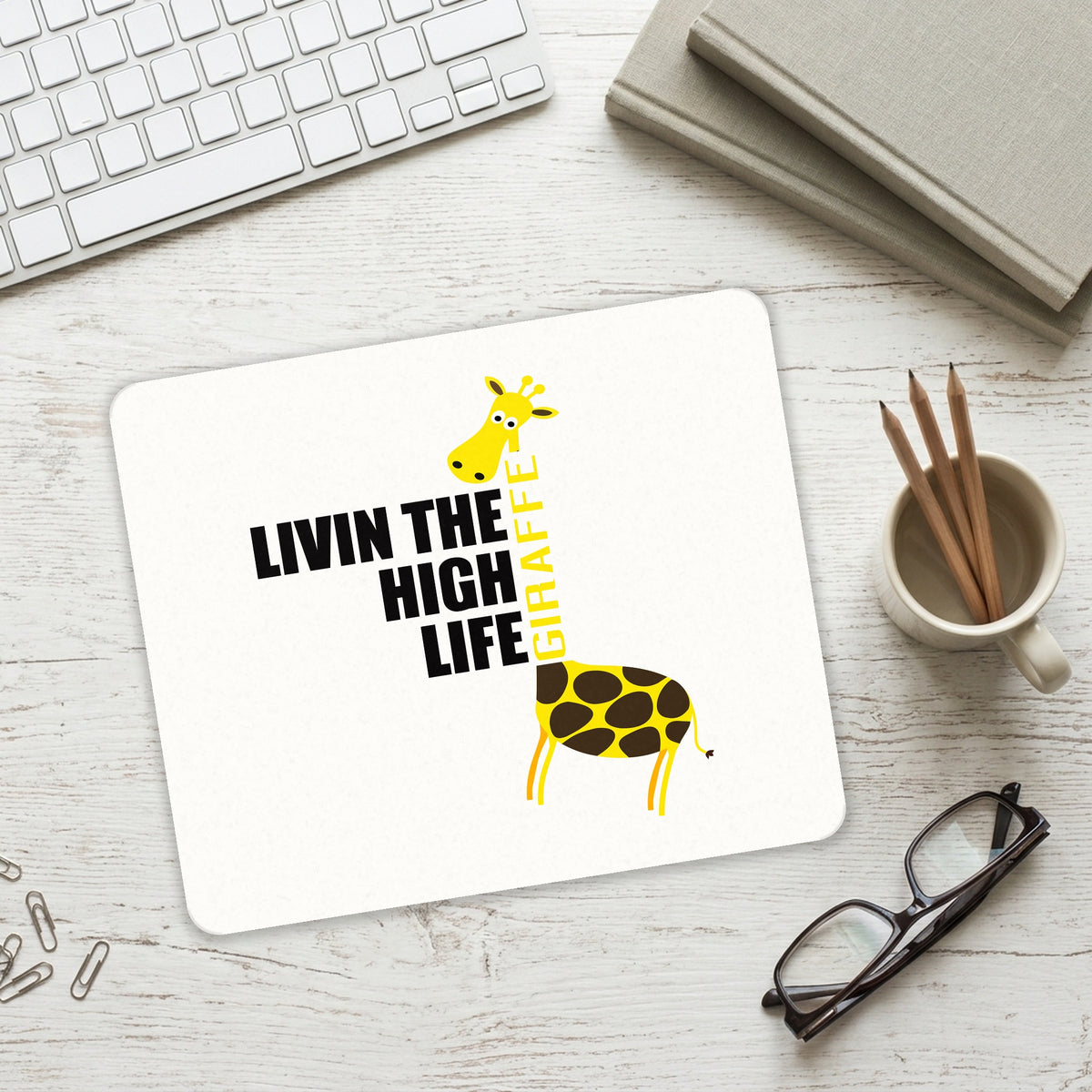 Livin the High Life - Giraffe mouse pad on a desk with a keyboard
